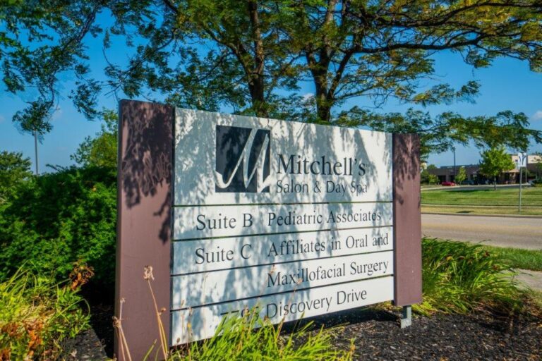Signboard under the tree of Cincinnati and West Chester Township s best beauty salon and spa Mitchell s Salon   Day Spa 1 768x512